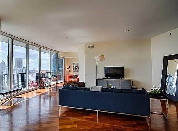 Bright open floor plan with beautiful hardwood floors.