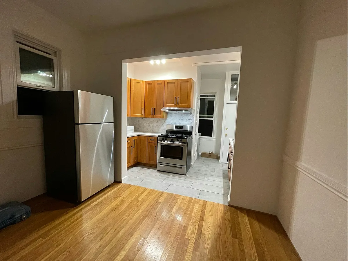 dining room and kitchen (nightime) - 3248 Folsom St #1