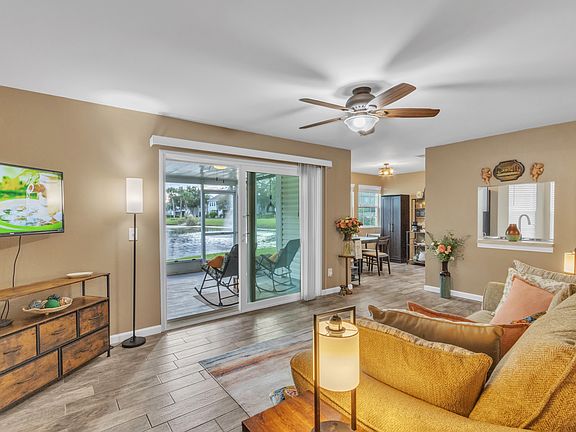 Sit back, relax & enjoy the sounds of the lake/pond. Furnished-turnkey & ready for arrival!