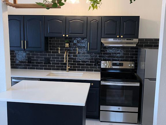 New quartz countertops, new stainless steel appliances, new floor, new sink, new backsplash