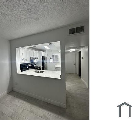 3rd image of 901 NE 209th Ter #105-26