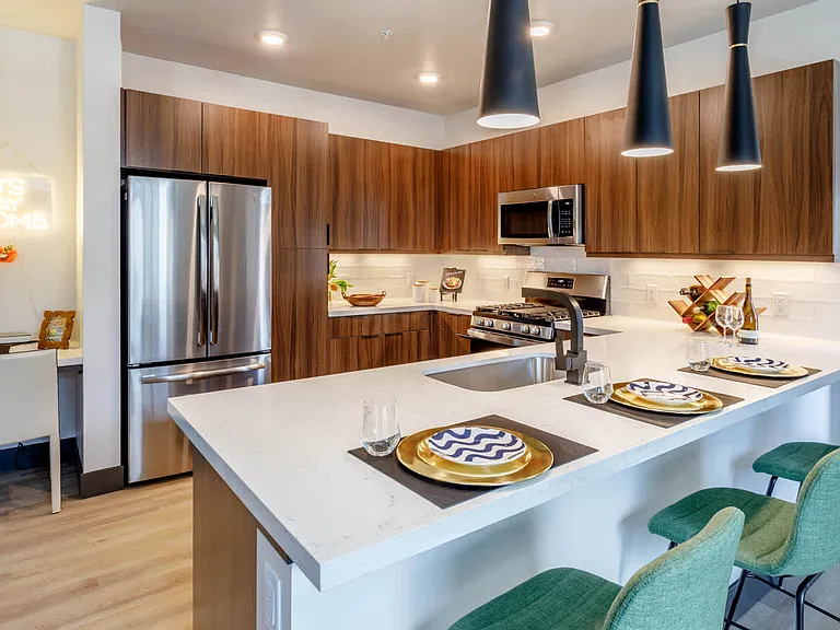 Kitchen with Breakfast Bar and Stainless Steel Appliances