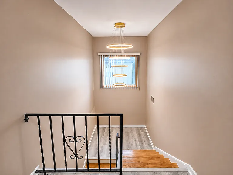 Updated stairway with modern lighting