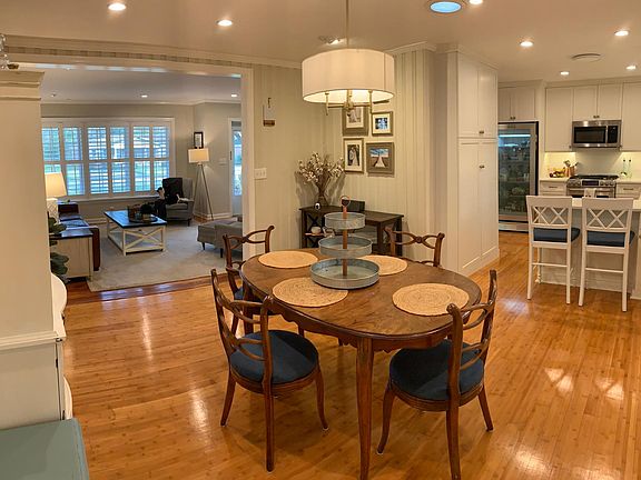 Dining/living area & kitchen, viewed from carport entry