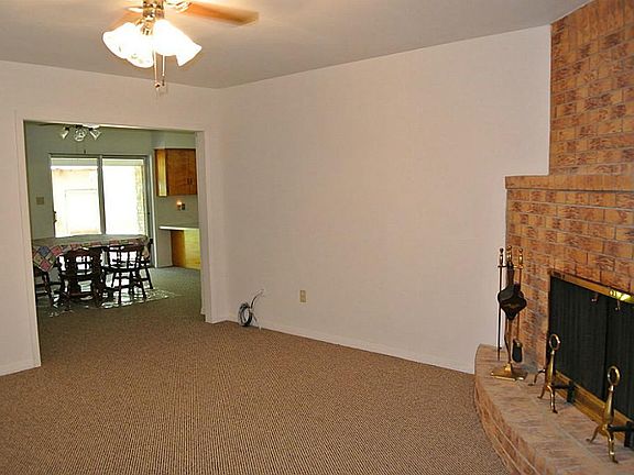 VIEW FROM FRONT DOOR LOOKING TOWARDS DINING/KITCHEN FROM LIVING ROOM