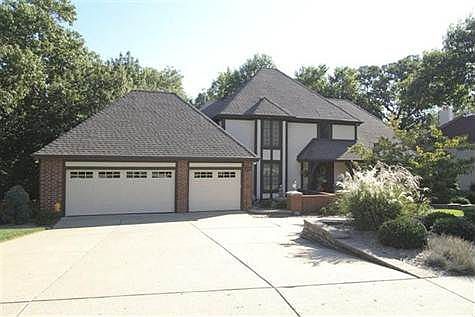 Newer architecural roof (shakes are gone!).  Newer garage doors and front circle drive for guests!