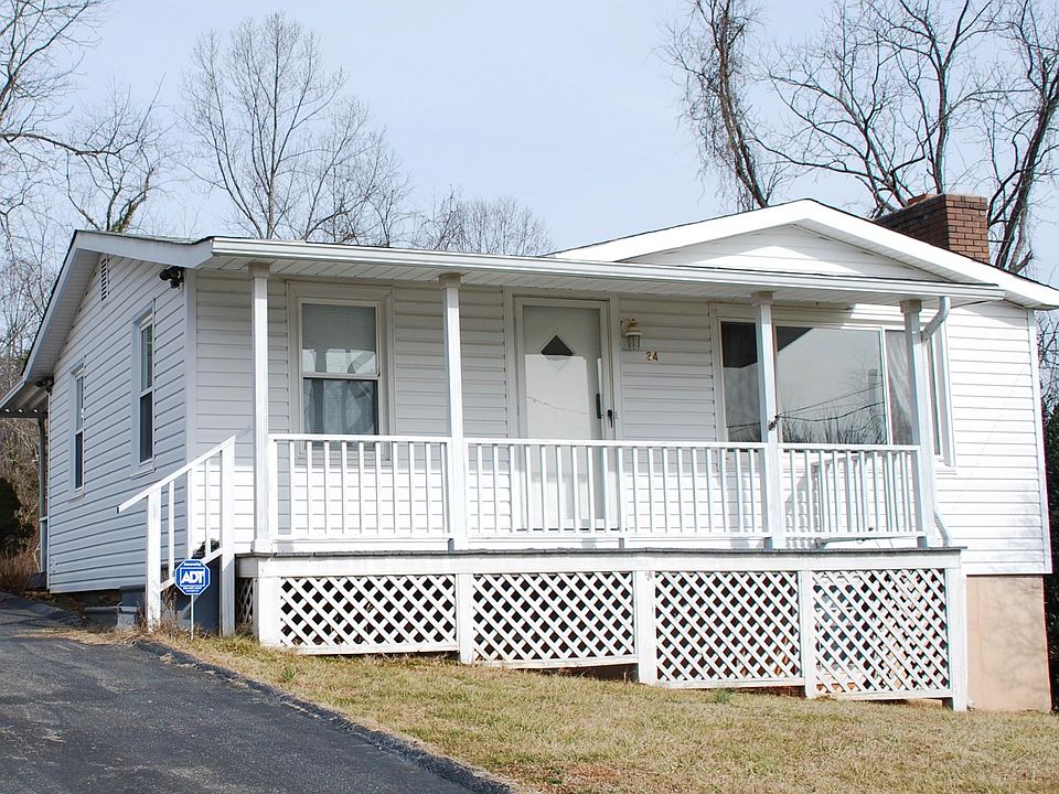 House sits up from the road with plenty of off street parkin