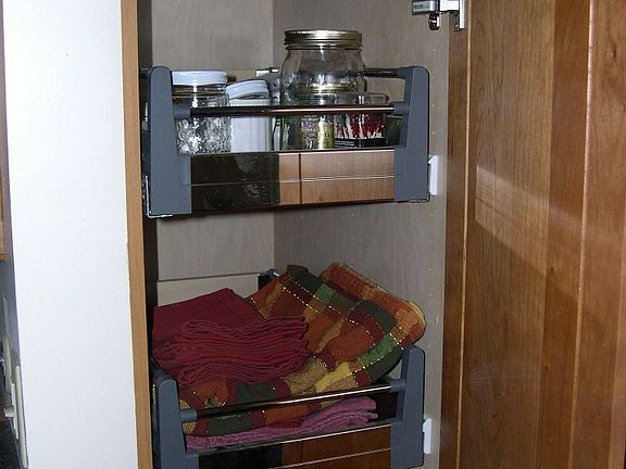 Sturdy pull-outs under counters and in this tall cabinet.