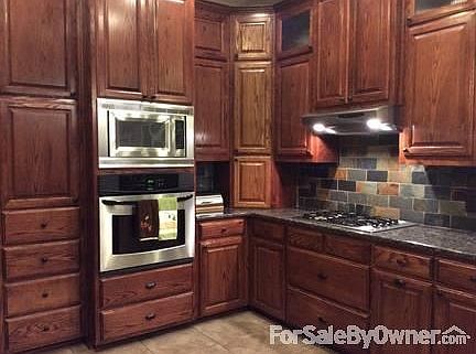 Kitchen
						:
						Plenty of cabinets in the kitchen