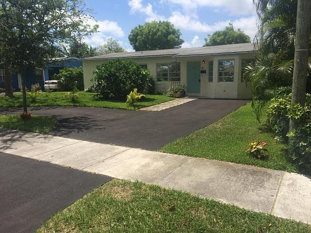 1st image of 320 NE 59th Ct