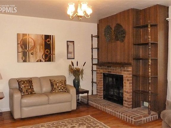 Living Room with wood burning Fireplace
