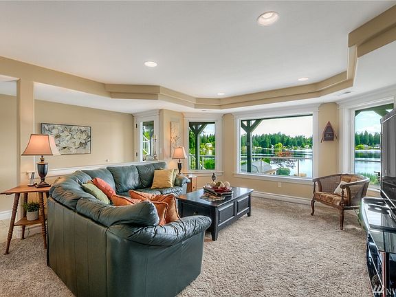 Master Chef's Kitchen w/ 48 in /subzero along with high end appliances!  Enjoy cooking and entertaining with a gorgeous view to look out at! 