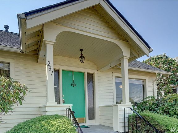 Welcome your guests on the inviting covered front porch. 