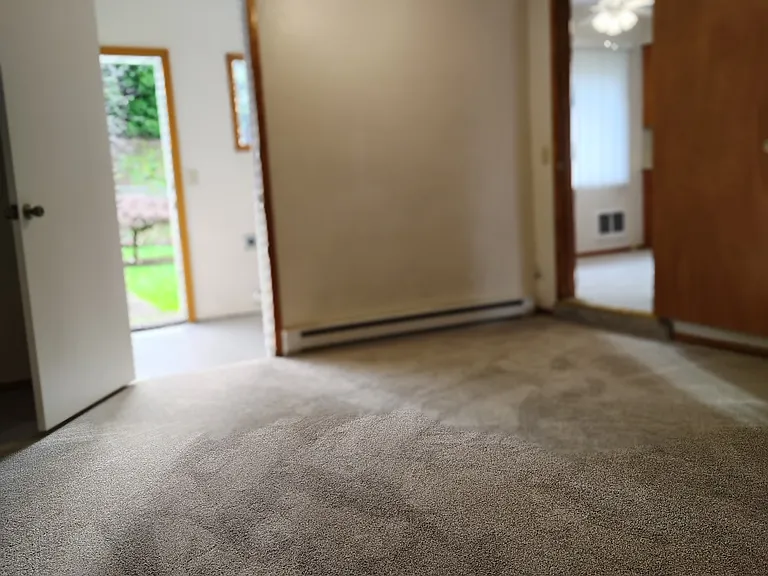 Family room leading to laundry room and dining room