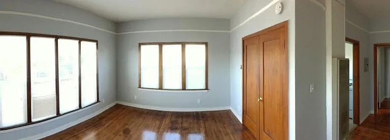 Living Room and view of hallway leading to kitchen and bedroom