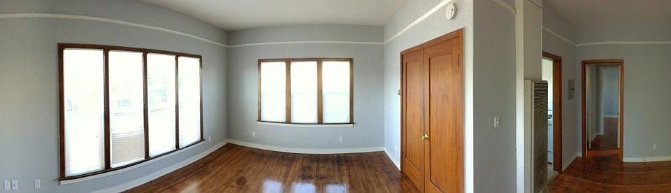 Living Room and view of hallway leading to kitchen and bedroom