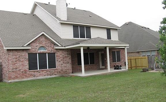 Huge covered back patio is integrated with home, with 2 fans, stereo and cable hookups and plenty of outlets. Solar shades on the windows help keep the home cool. New fencing (2016) in South corner.