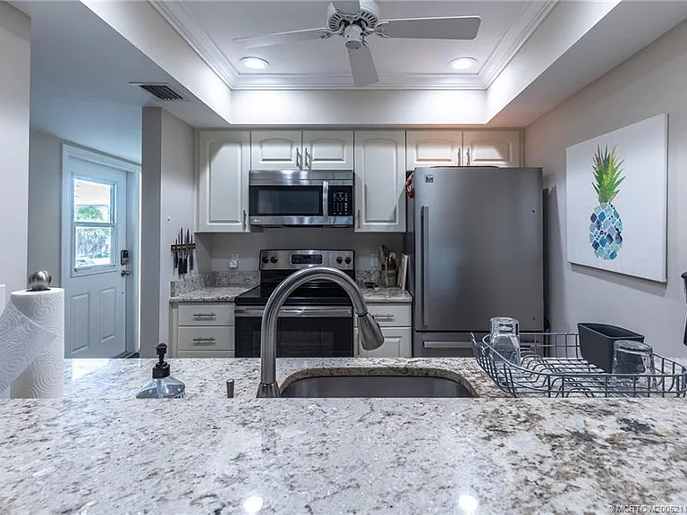 5596 NE Gulfstream Way — Photo 19