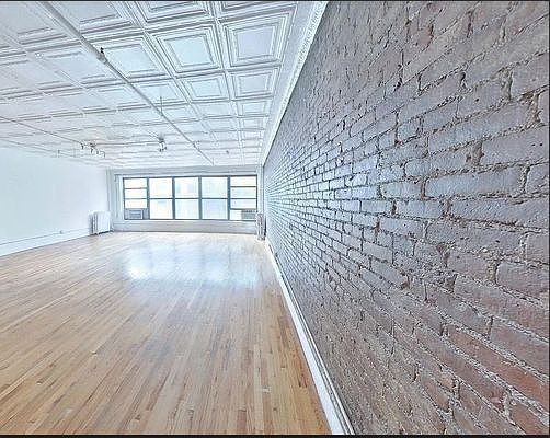 1st image of 115 W 23rd St APT 23