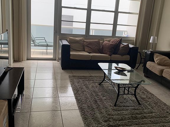 Spacious living room with lots of natural lights & terrace