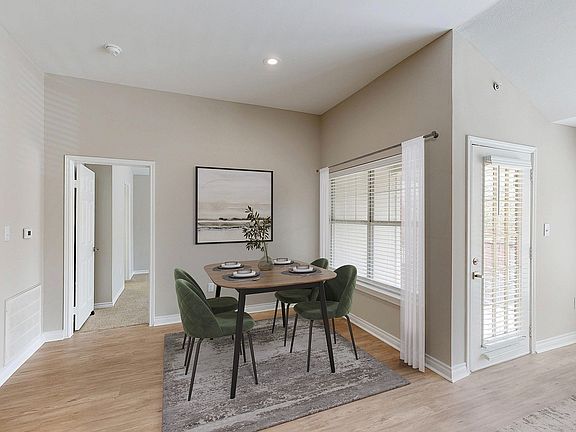 Newly Renovated Dining Area with Gorgeous Hardwood-Style Flooring
