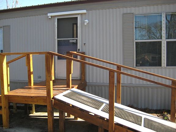Front entrance has steps and ramp