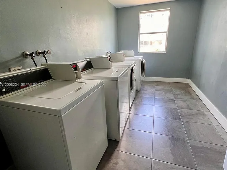700 NW 214th St #411 — Photo 18
