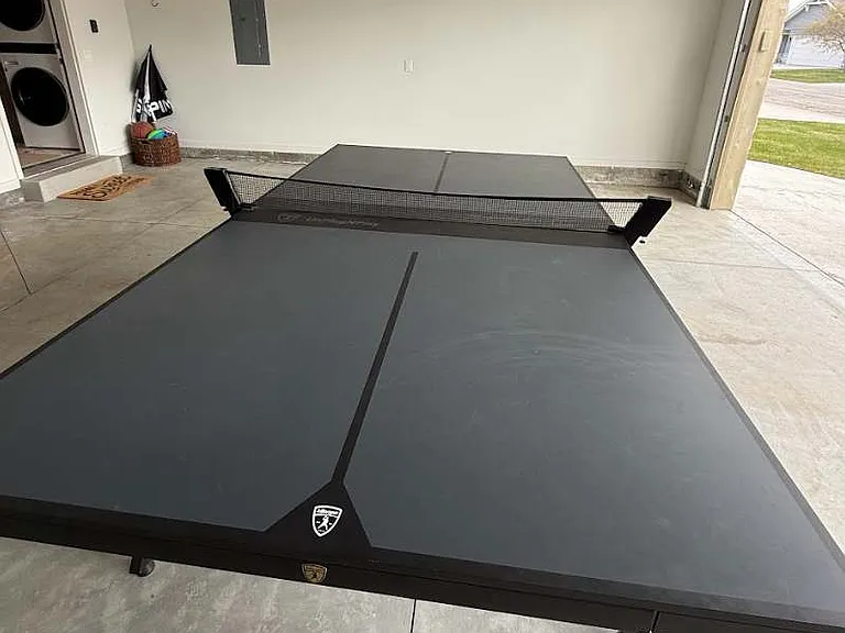 Two car garage with ping pong table