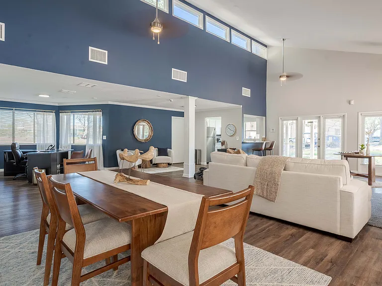 Experience luxurious living in this beautifully designed open-plan space featuring high ceilings and abundant natural light.