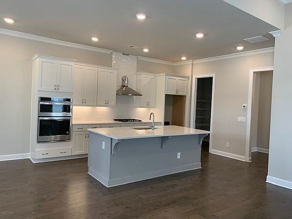 Sample picture of another Hampton- the one we are building will have cabinets up to the 10 foot ceil