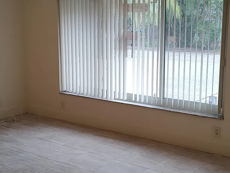 Living room is very big; it faces out the front door