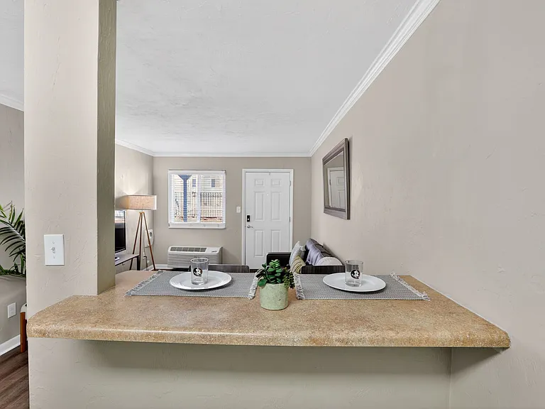Dine and Relax in the Open-Concept Living Area at Seminole Flatts