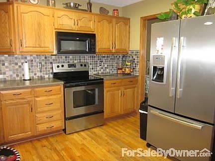 Kitchen
						:
						Refrigerator stays with the house