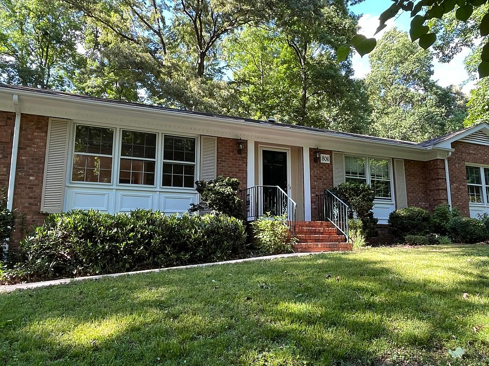 big wooded lot far back from street