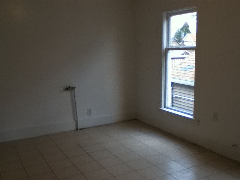 Apt #2 Ceramic Tile Floors In Kitchen