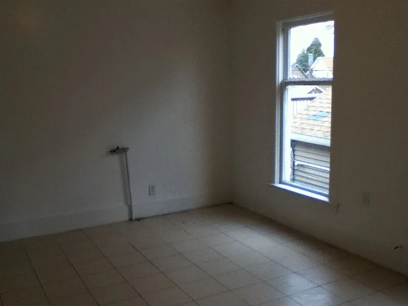 Apt #2 Ceramic Tile Floors In Kitchen