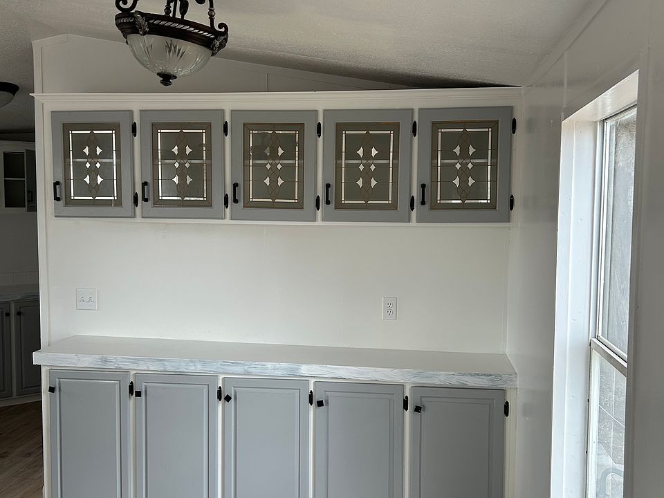 Breakfast area with counter space and cabinets