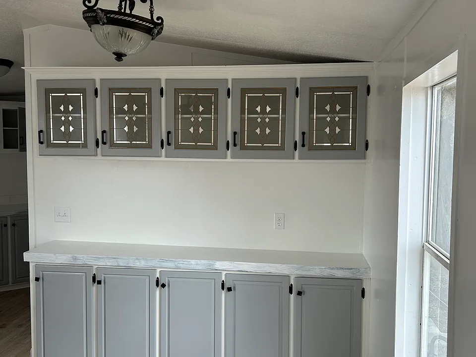 Breakfast area with counter space and cabinets