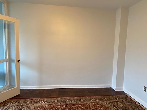 Adjacent wall when looking into room from large walk in closet