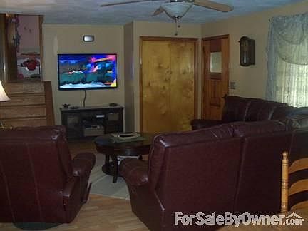 Living room and view of the stairs