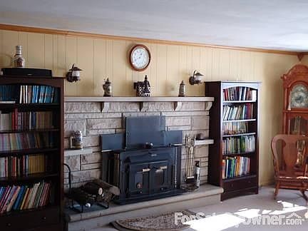 Large living room with buck stove
						:
						Newcarpet and freshly painted interior walls