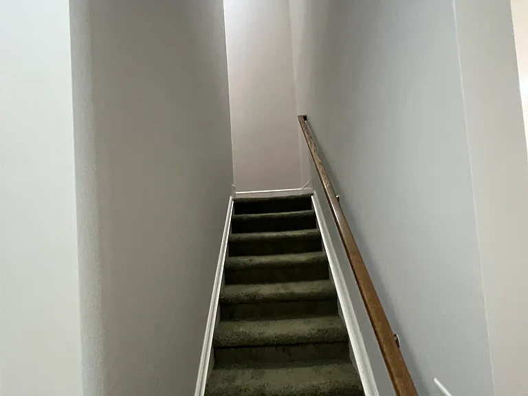 Stairway to Second Story of Unit