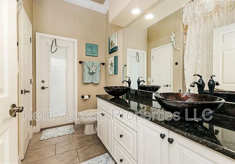 1229 Lake Deeson Woods Ln — Photo 14