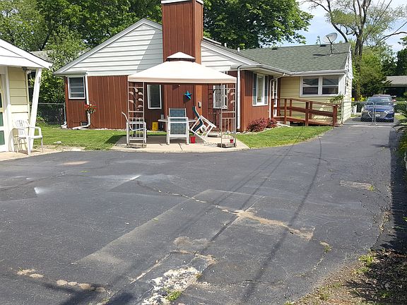 back of house with patio