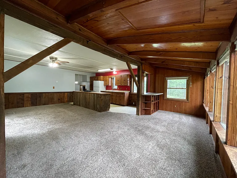 Living area toward dining and kitchen