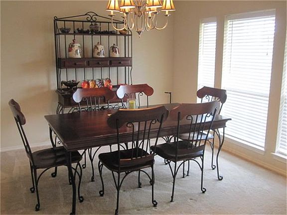 The formal dining has an elegant appearance for those special "formal" gatherings yet cozy enough for a family feast or more intimate meal.