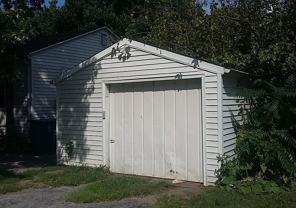 Garage, with space for additional car.