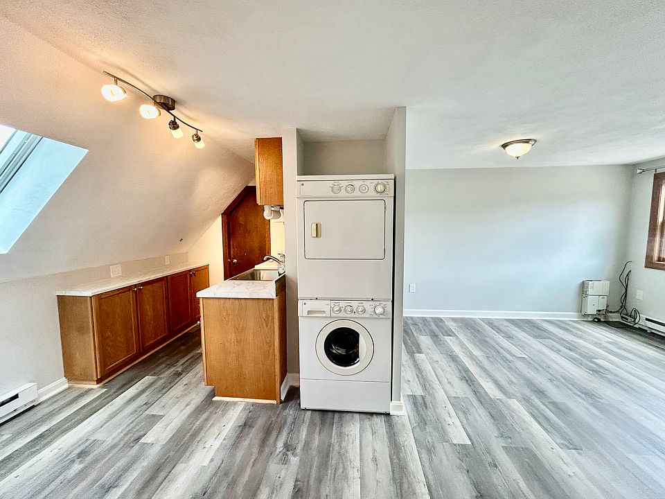 Washer and dryer - view of Kitchen and Living room.