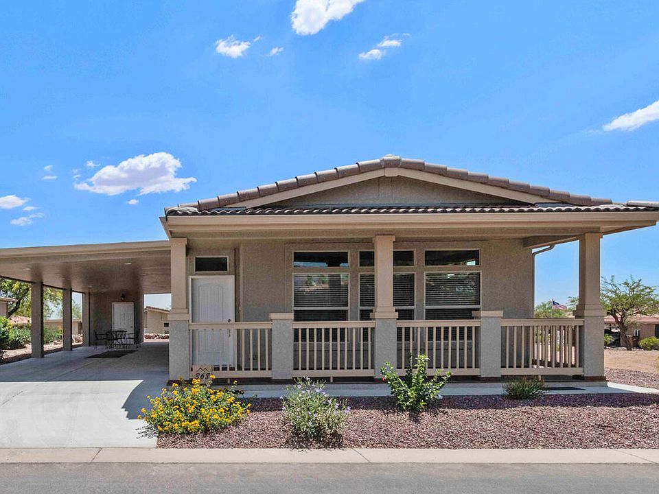 large front porch lets you sit and take in the views.