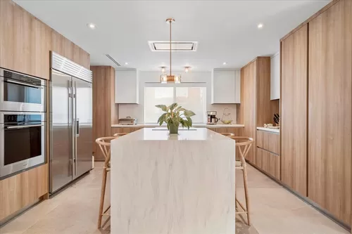 Unleash your inner chef in this stunning Italian Kitchen by Mia Cuccina elevating your culinary creations with a suite of top-of-the-line appliances, including a steam oven, convection oven, and Wolf induction cooktop with a sleek, remote-controlled, ceil - 9041 Abbott Ave
